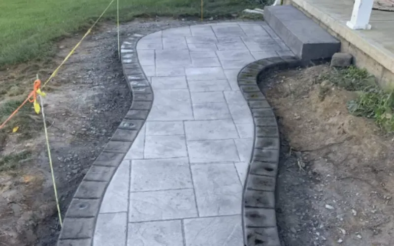 stained and stamped concrete front walkway